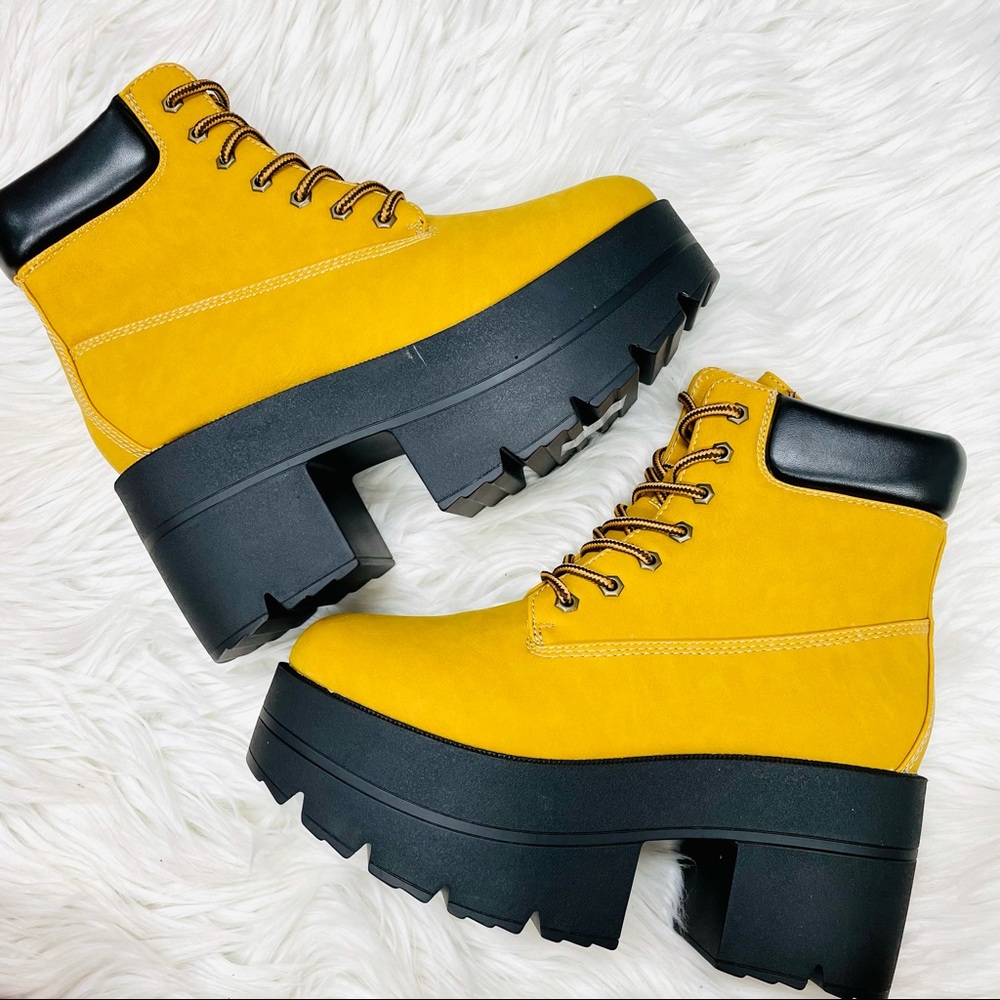 Tan lug sole heeled boot